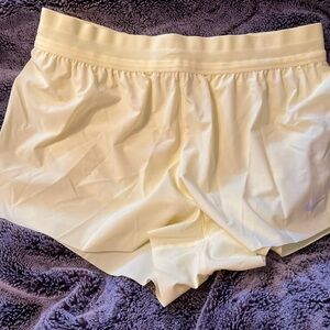 NWT women’s yellow running shorts medium